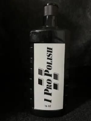 Bottle of Pro Polish on a dark background.