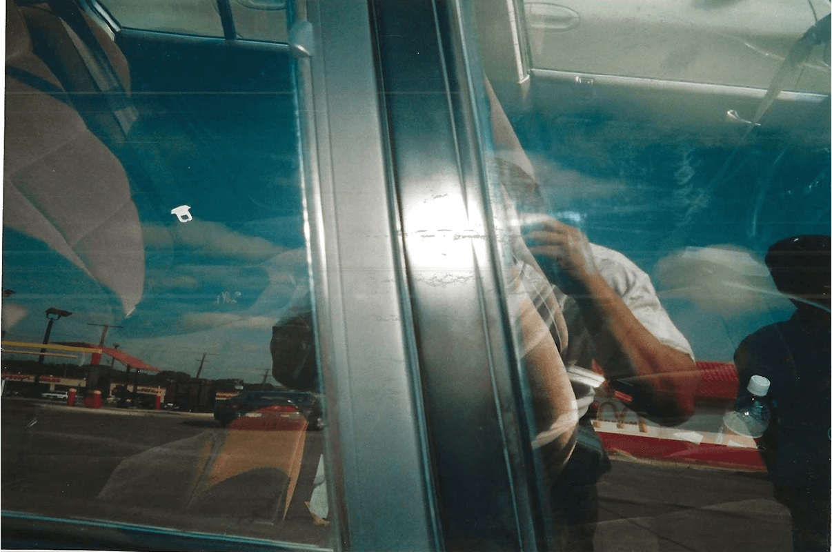 Reflection on glass with blue sky